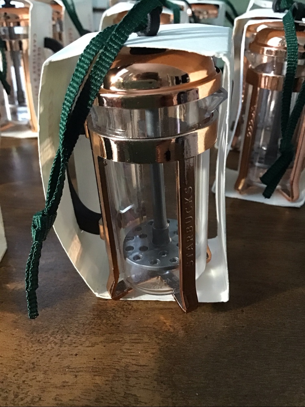 Miniature copper-toned Starbucks French press Christmas tree ornaments ☕️ coffee